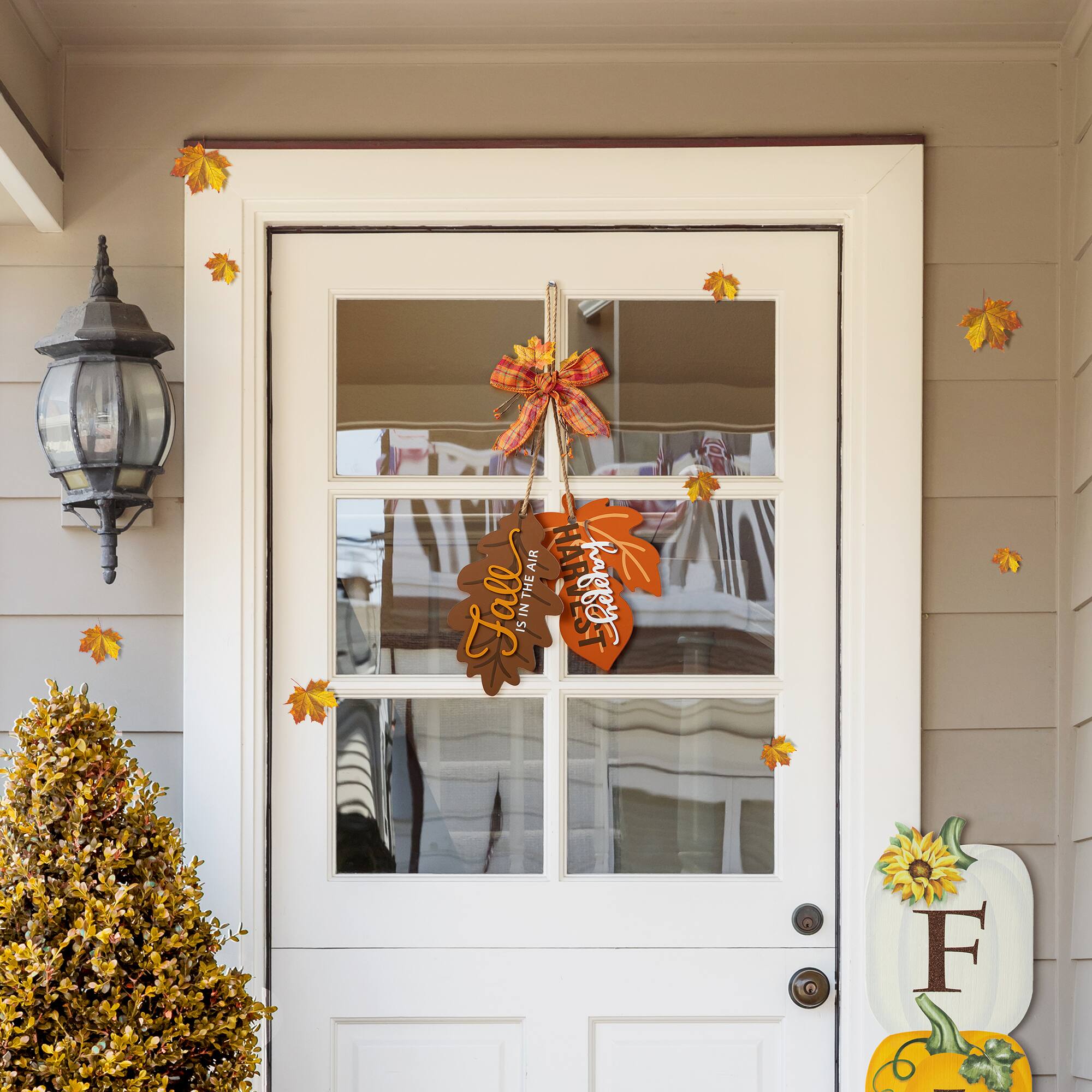 Glitzhome® 24.5" Fall Wood Maple Leaves with Bowknot Door Hanger
